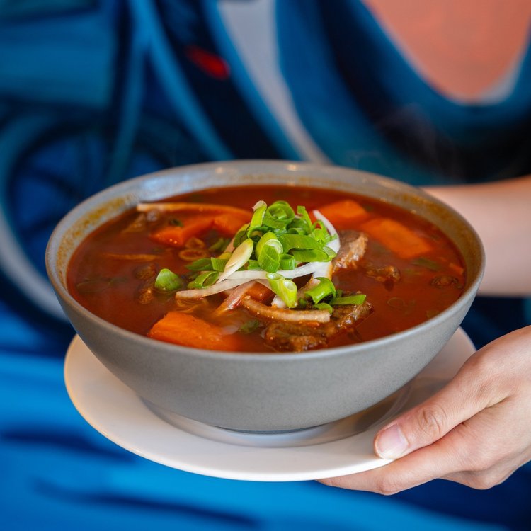 Beef stew noodle soup with carrots