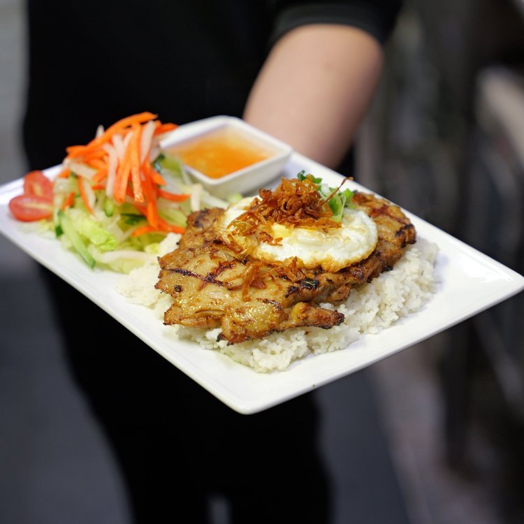 Lemongrass chicken and fried egg on rice