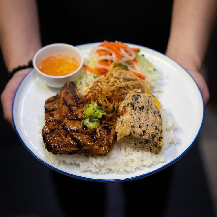 Pork three ways on rice with meatloaf