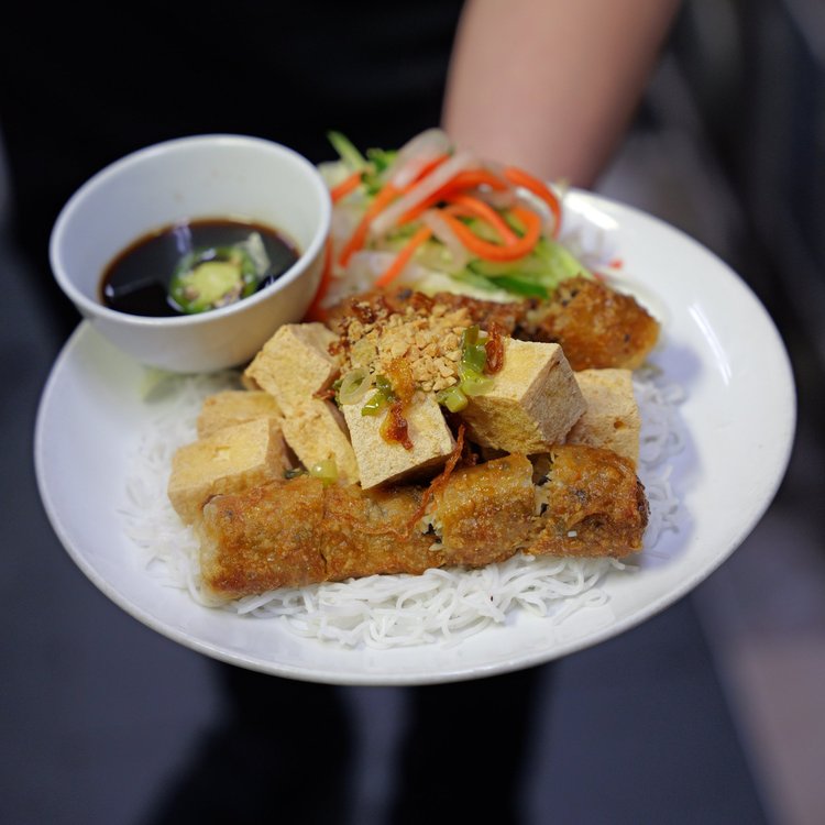 Vegetarian vermicelli with tofu and spring rolls