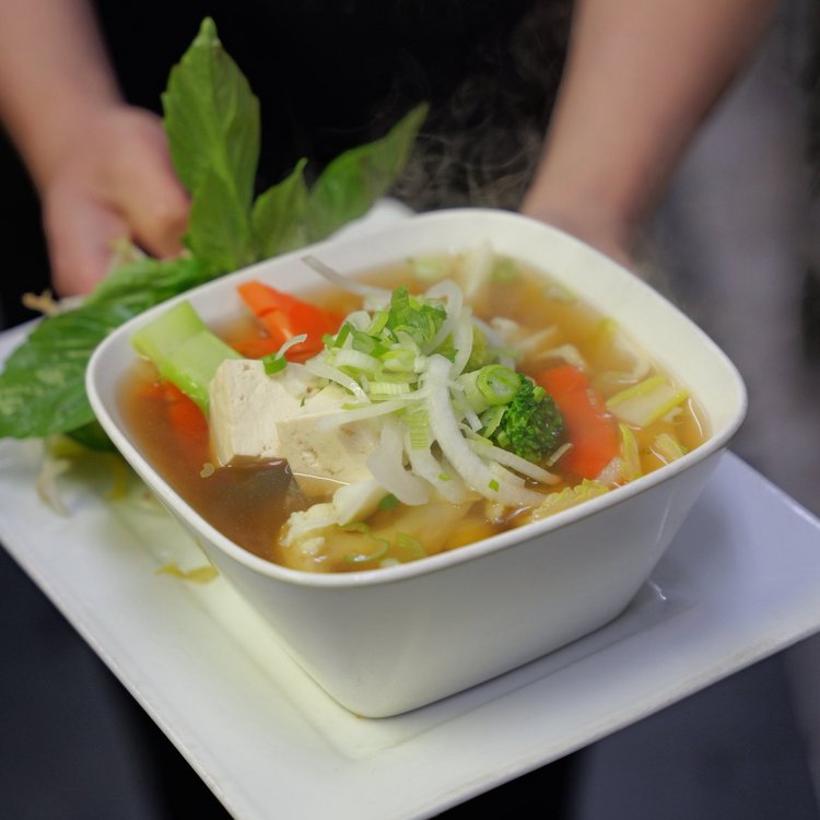 Vegan pho with tofu and vegetables
