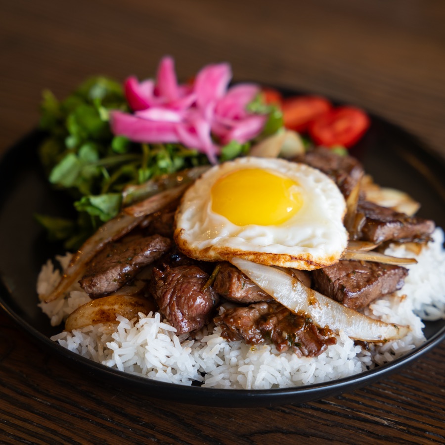Shaken beef with fried egg on rice